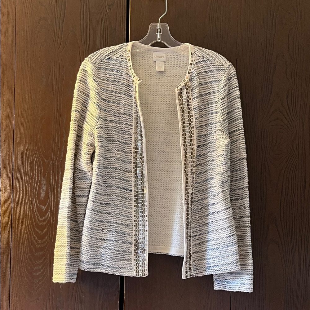 Chico’s long sleeved white with blue stripes jacket. Size Chico 1.